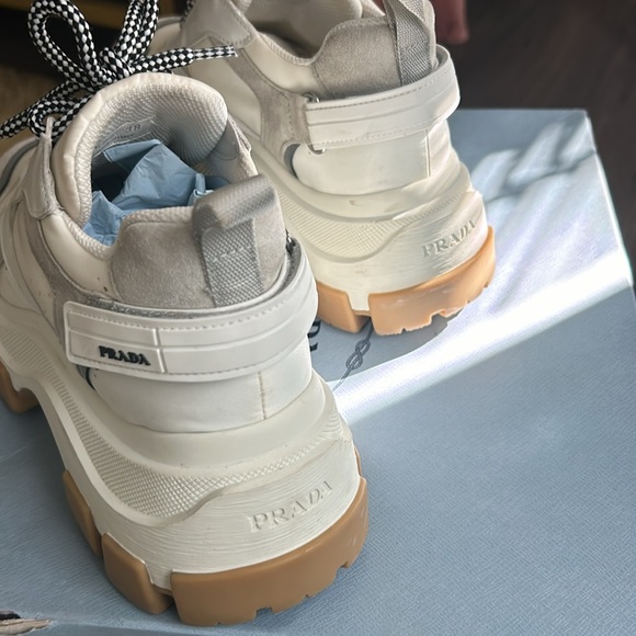 Prada sneakers It has a couple of little spots on it that’s cleanable. - Picture 4 of 12